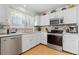 View of a well-lit kitchen with a stainless steel oven and microwave at 19411 E Milan Cir, Aurora, CO 80013