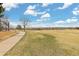 Vast open field at the park for recreation, with a walking path at 19411 E Milan Cir, Aurora, CO 80013