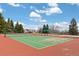 Well-maintained community tennis court perfect for sports and recreation activities at 19411 E Milan Cir, Aurora, CO 80013
