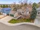 Desirable home with an attached garage, lush lawn, and mature trees at 6282 Yank Ct, Arvada, CO 80004
