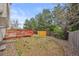 The backyard features a spacious deck with a manicured yard at 6282 Yank Ct, Arvada, CO 80004