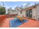 Charming outdoor deck with dining area, perfect for enjoying sunny days at 6282 Yank Ct, Arvada, CO 80004