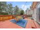 Outdoor deck with colorful seating and a dining area for al fresco meals at 6282 Yank Ct, Arvada, CO 80004