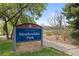Meadowlake Park sign, showcasing the City of Arvada's commitment to community green spaces at 6282 Yank Ct, Arvada, CO 80004