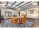 Versatile attic space with wood floors, a large rug, a table, and comfortable seating at 555 E 10Th Ave # 206, Denver, CO 80203