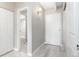 Hallway with access to the bathroom and white doors at 555 E 10Th Ave # 206, Denver, CO 80203