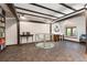 Stylish library area with built-in bookshelves and a charming spiral staircase at 555 E 10Th Ave # 206, Denver, CO 80203