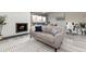 Bright living room features a fireplace, comfortable seating, and great natural light at 555 E 10Th Ave # 206, Denver, CO 80203