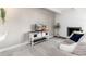 Cozy living room features a modern entertainment center, fireplace, and neutral tones at 555 E 10Th Ave # 206, Denver, CO 80203