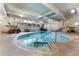 Indoor swimming pool with bright light and seating areas; a perfect place to relax and exercise at 555 E 10Th Ave # 206, Denver, CO 80203