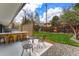 Backyard featuring a patio with an outdoor kitchen and a manicured yard at 3275 19Th St, Boulder, CO 80304