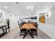 Basement dining area with wet bar, stylish decor, and light wood flooring at 3275 19Th St, Boulder, CO 80304