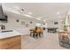 Finished basement with dining area, kitchenette, and entertainment space at 3275 19Th St, Boulder, CO 80304
