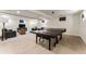 Finished basement with entertainment area and ping pong table at 3275 19Th St, Boulder, CO 80304