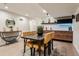 Finished basement with kitchenette featuring modern fixtures and a dining area at 3275 19Th St, Boulder, CO 80304