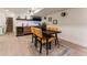 Basement dining area with kitchenette including wine cooler and tile backsplash at 3275 19Th St, Boulder, CO 80304