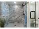 Glass enclosed shower with stylish tile and modern fixtures at 3275 19Th St, Boulder, CO 80304