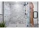 A modern bathroom with sleek design elements, including a glass shower and tiled walls at 3275 19Th St, Boulder, CO 80304