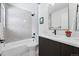 Modern bathroom featuring gray subway tile, sleek vanity, and a shower-over-tub combination at 3275 19Th St, Boulder, CO 80304