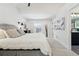 A serene main bedroom with plush carpeting, modern lighting, and access to a private outdoor patio at 3275 19Th St, Boulder, CO 80304