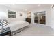 Bright bedroom featuring a sliding glass door and neutral decor at 3275 19Th St, Boulder, CO 80304