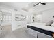 A spacious bedroom features soft carpet, modern lighting, and a convenient walk-in closet at 3275 19Th St, Boulder, CO 80304