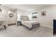 Bright bedroom with a view of a small desk and a queen sized bed at 3275 19Th St, Boulder, CO 80304