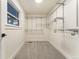 Walk-in closet with built-in shelving and window at 3275 19Th St, Boulder, CO 80304