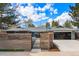Attractive single-story home with modern curb appeal, featuring a fenced yard, private gate, and a spacious driveway at 3275 19Th St, Boulder, CO 80304