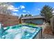 Backyard with a hot tub, patio seating, and stylish outdoor space for relaxation and entertainment at 3275 19Th St, Boulder, CO 80304