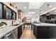 Modern kitchen with sleek countertops, stainless steel appliances, and an open design flowing into the dining area at 3275 19Th St, Boulder, CO 80304