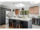 Contemporary kitchen with a large center island, stainless steel appliances, and a built-in wine cooler at 3275 19Th St, Boulder, CO 80304