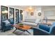 Inviting living room with hardwood floors, recessed lights, and multiple large windows for an abundance of light at 3275 19Th St, Boulder, CO 80304