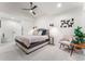 Bright main bedroom featuring carpet, modern decor, recessed lighting, and a ceiling fan at 3275 19Th St, Boulder, CO 80304