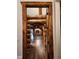Entryway shows log architecture, and access to the home's living areas and staircase at 733 Rainbow Rd, Idaho Springs, CO 80452