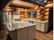 Bright kitchen boasts custom cabinets, granite counters, and stainless steel appliances at 733 Rainbow Rd, Idaho Springs, CO 80452