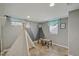 A playful bedroom with a white teepee and mountain mural on gray painted walls at 1552 Hudson St, Denver, CO 80220