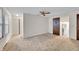 Bedroom with closet, ceiling fan, and carpeted floor at 8487 Yarrow Ct, Arvada, CO 80005