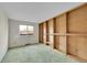 Bedroom with window, carpet, and large shelving unit at 8487 Yarrow Ct, Arvada, CO 80005