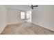 Bedroom with two windows and plush carpeting at 8487 Yarrow Ct, Arvada, CO 80005