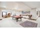 Recreational room with a pool table, carpet and game table with chairs at 13 Buell Mansion Pkwy, Englewood, CO 80113