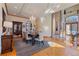 Elegant dining room featuring a chandelier, hardwood floors, and sophisticated decor at 11541 Warrington Ct, Parker, CO 80138