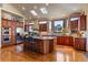 Spacious kitchen with granite countertops, stainless steel appliances, and a large center island at 11541 Warrington Ct, Parker, CO 80138