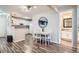 Bright dining area adjacent to the kitchen with white table set at 7895 Allison Way # 203, Arvada, CO 80005