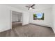 Spacious bedroom featuring soft carpet and window with bright outdoor views at 3022 S Wheeling Way # 109, Aurora, CO 80014