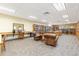 Tranquil library featuring bookshelves, comfortable seating, and a dedicated computer area for reading and research at 3022 S Wheeling Way # 109, Aurora, CO 80014