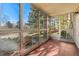 Screened in porch with lots of light and a view of the neighborhood at 3022 S Wheeling Way # 109, Aurora, CO 80014