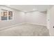 Basement room offering plush carpet, a window, and recessed lighting at 9561 Brentford Dr, Highlands Ranch, CO 80130