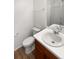 Clean bathroom with single sink vanity and shower stall at 25643 E Bayaud Ave, Aurora, CO 80018