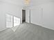 Bright bedroom with window and grey carpet at 25643 E Bayaud Ave, Aurora, CO 80018